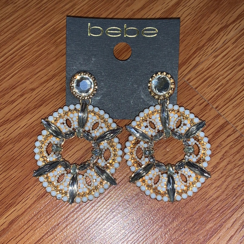 Bebe white & gold rhinestone earrings
